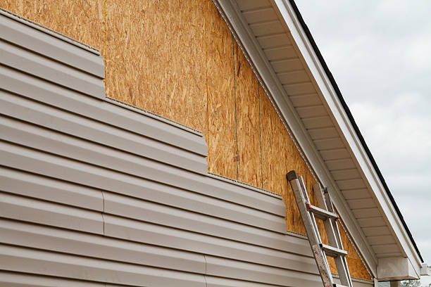 Professional Siding Installation technician working in Denton, TX
